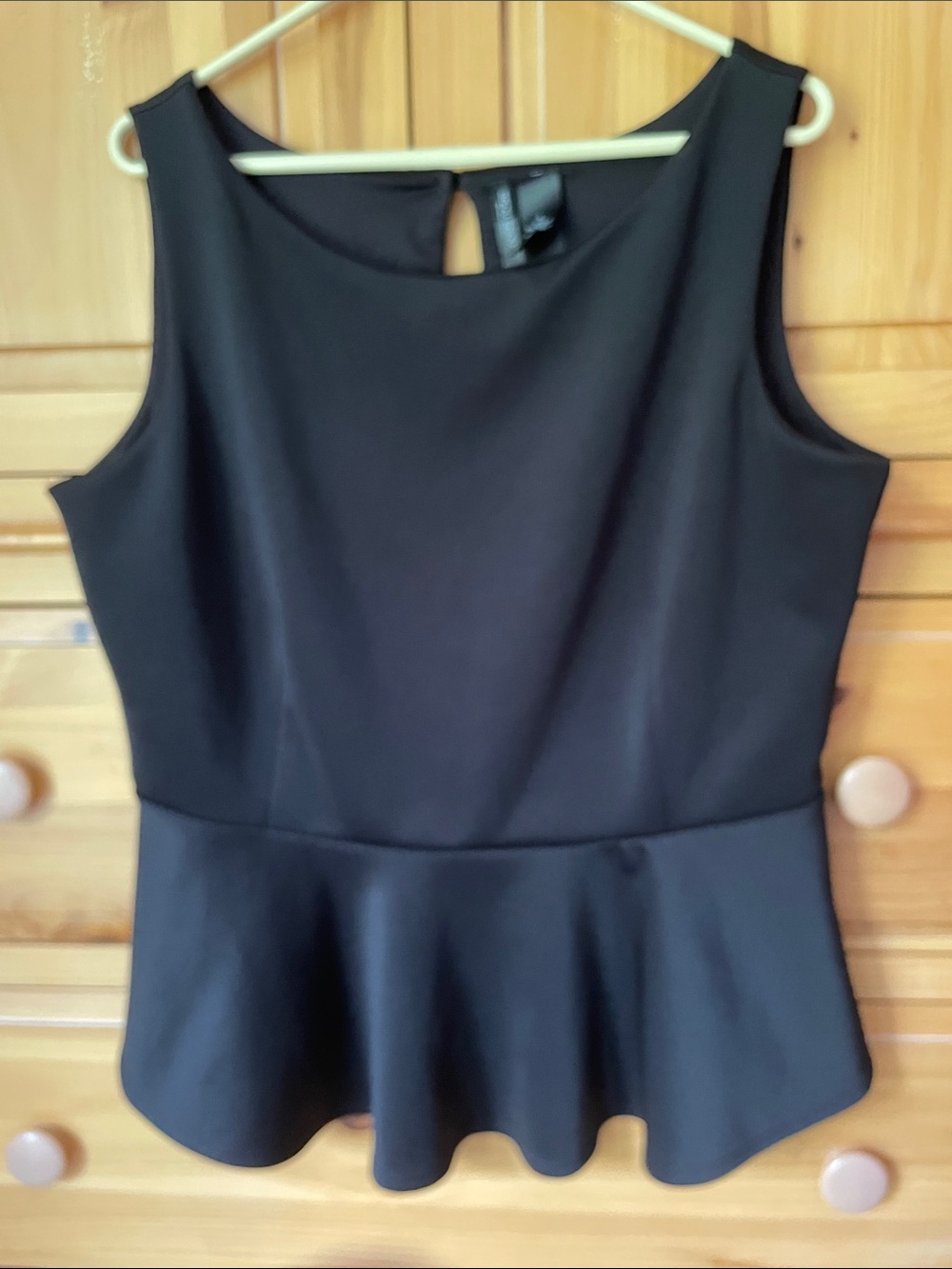 Bisou Bisou Sleeveless Black Peplum Top